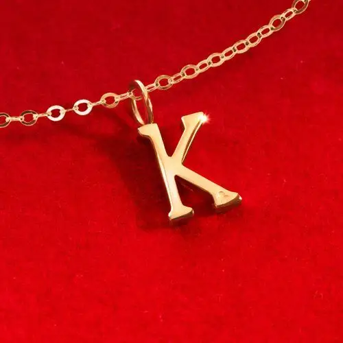 Bransoletka z literką K ze złota próby 585 na łańcuszku