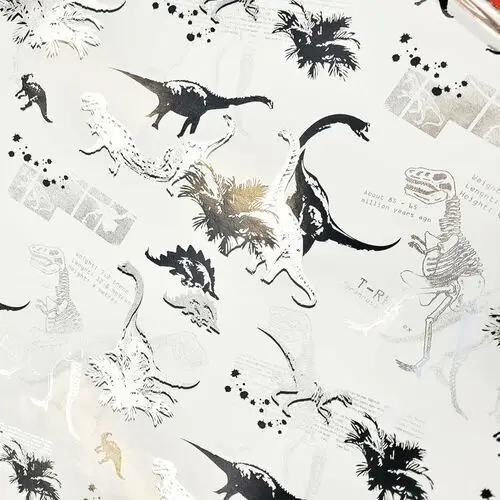 Papier biały dinozaury do prezentów 57cmx20m 20m336
